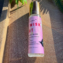 Kitty Karma Studio: The Wish Cat perfume roller on a sunlit wooden board