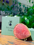 Kitty Karma Studio: Seashell compact beside branded box