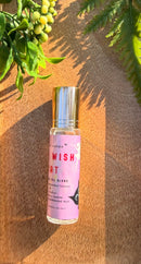 Kitty Karma Studio: The Wish Cat perfume roller on wooden board