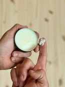 Daily Grind Tipsy Santa Beard Balm with vanilla, bourbon, and candy cane fragrance