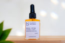 Elodie's Naturals: Orange face oil serum in dropper bottle