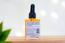 Elodie's Naturals: Rear label of orange serum bottle