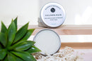 Elodie's Naturals: Closed and open cleansing balm tins