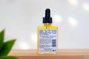 Elodie's Naturals: Rear label of golden serum bottle