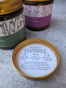 Kitty Karma Studio: Candle lid with printed instructions beside jars